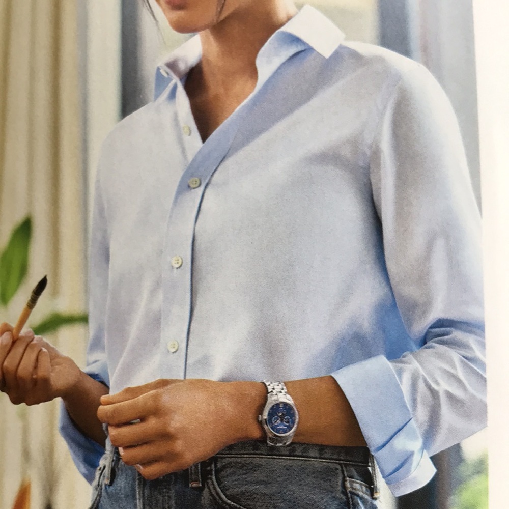 Light blue boutique blouse HBaskin buttons